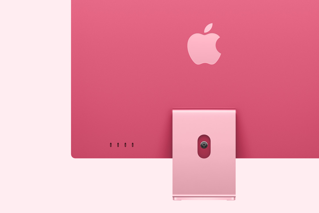 Vista posterior de un iMac rosado, que destaca los cuatro puertos USB-C